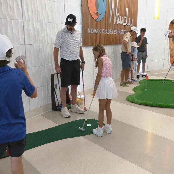 PGA GOLFERS WITH DIABETIC KIDS